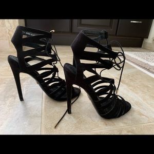 Suede lace up shoes.